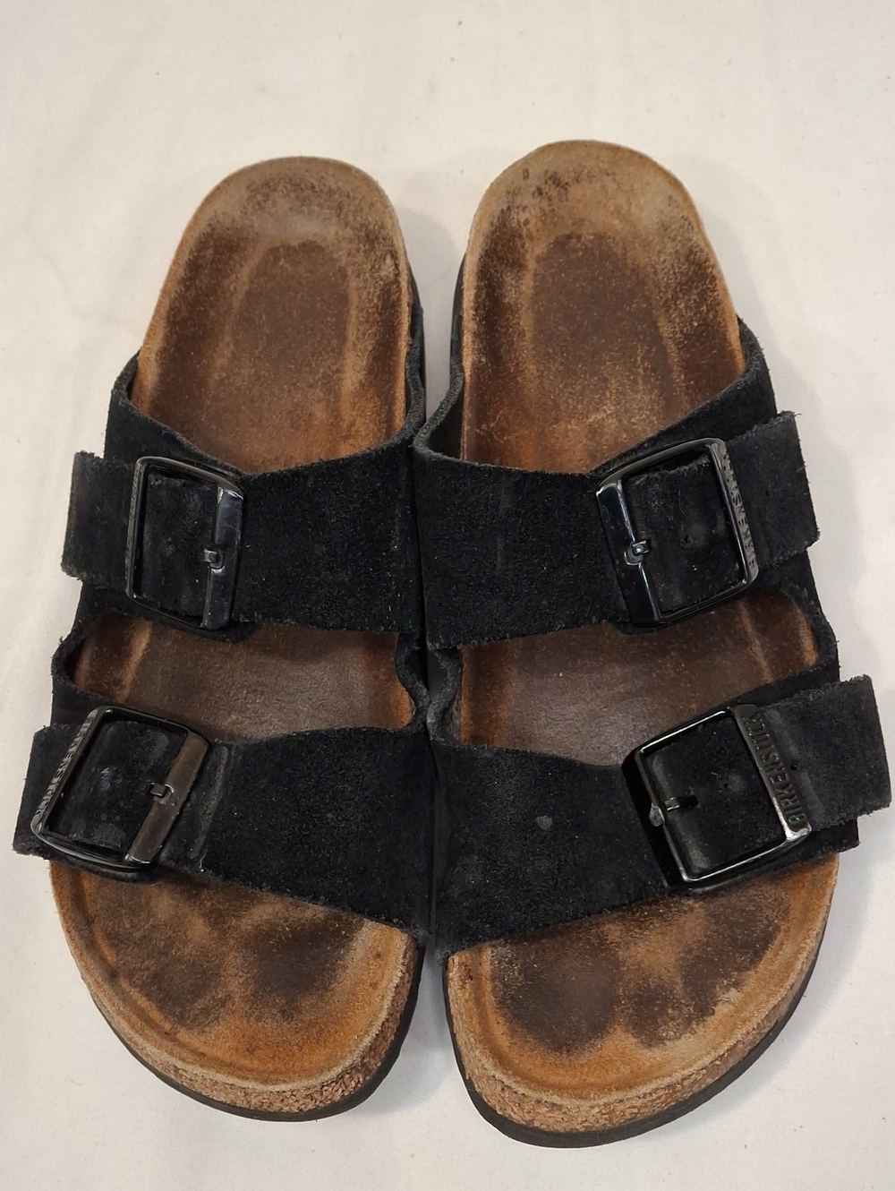 Birkenstock Black Suede Two-Strap Buckle Slide Sandals. Classic Style